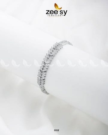 Masaic Bracelet - Designer Dress with Intricate embroidery and embellishments. Shop elegent wedding dress at Maria Faisal.