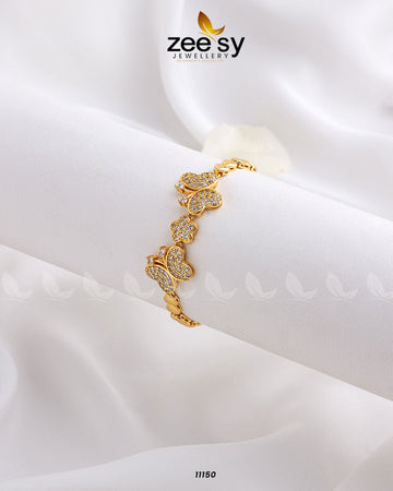 Butterfly Bracelets - Designer Dress with Intricate embroidery and embellishments. Shop elegent wedding dress at Maria Faisal.