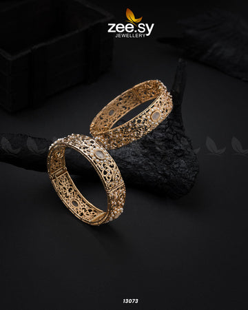 Hyderabadi Kara Bangles - Designer Dress with Intricate embroidery and embellishments. Shop elegent wedding dress at Maria Faisal.