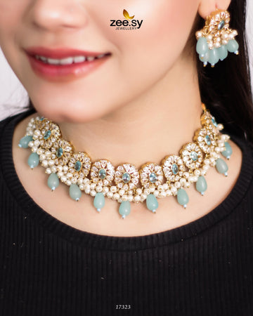 Blooming Flower Necklace - Designer Dress with Intricate embroidery and embellishments. Shop elegent wedding dress at Maria Faisal.