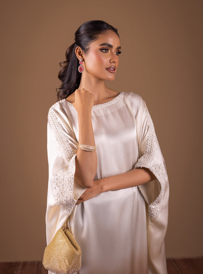 Zainab Chottani | The Kaftan Edit | Champagne Flame - Formal Dress - available at Maria Faisal in UK and USA.