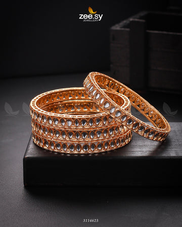 Ethereal Charm Bangles - Designer Dress with Intricate embroidery and embellishments. Shop elegent wedding dress at Maria Faisal.