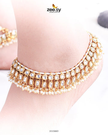 Oliena Anklets - Designer Dress with Intricate embroidery and embellishments. Shop elegent wedding dress at Maria Faisal.
