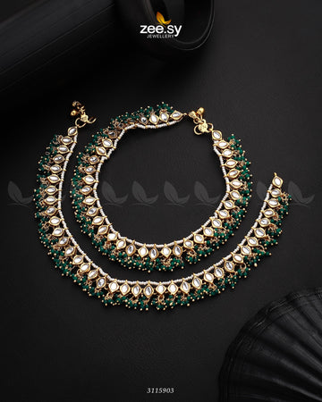 Demantoid Anklets - Designer Dress with Intricate embroidery and embellishments. Shop elegent wedding dress at Maria Faisal.