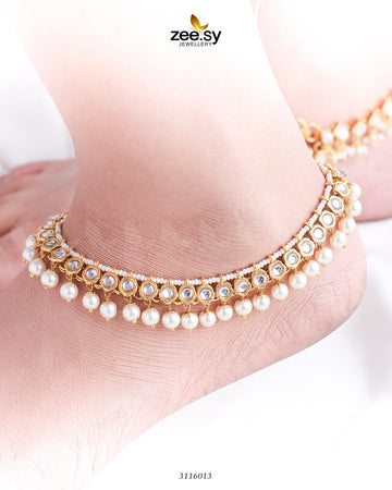 Filiano Anklets - Designer Dress with Intricate embroidery and embellishments. Shop elegent wedding dress at Maria Faisal.