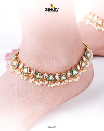 Zarmina Anklet - Designer Dress with Intricate embroidery and embellishments. Shop elegent wedding dress at Maria Faisal.