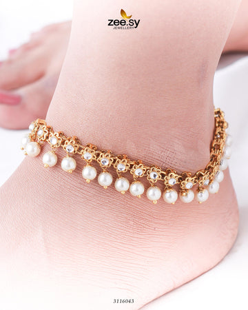 Umika Anklets - Designer Dress with Intricate embroidery and embellishments. Shop elegent wedding dress at Maria Faisal.