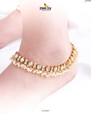 Enstatite Anklet - Designer Dress with Intricate embroidery and embellishments. Shop elegent wedding dress at Maria Faisal.