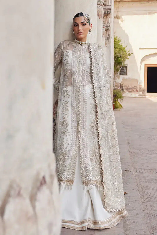 Afrozeh Dastangoi Wedding Formals Noori– Off White Pakistani Dress with intricate embroidery and embellishments. Shop elegant Asian dresses at Maria Faisal.