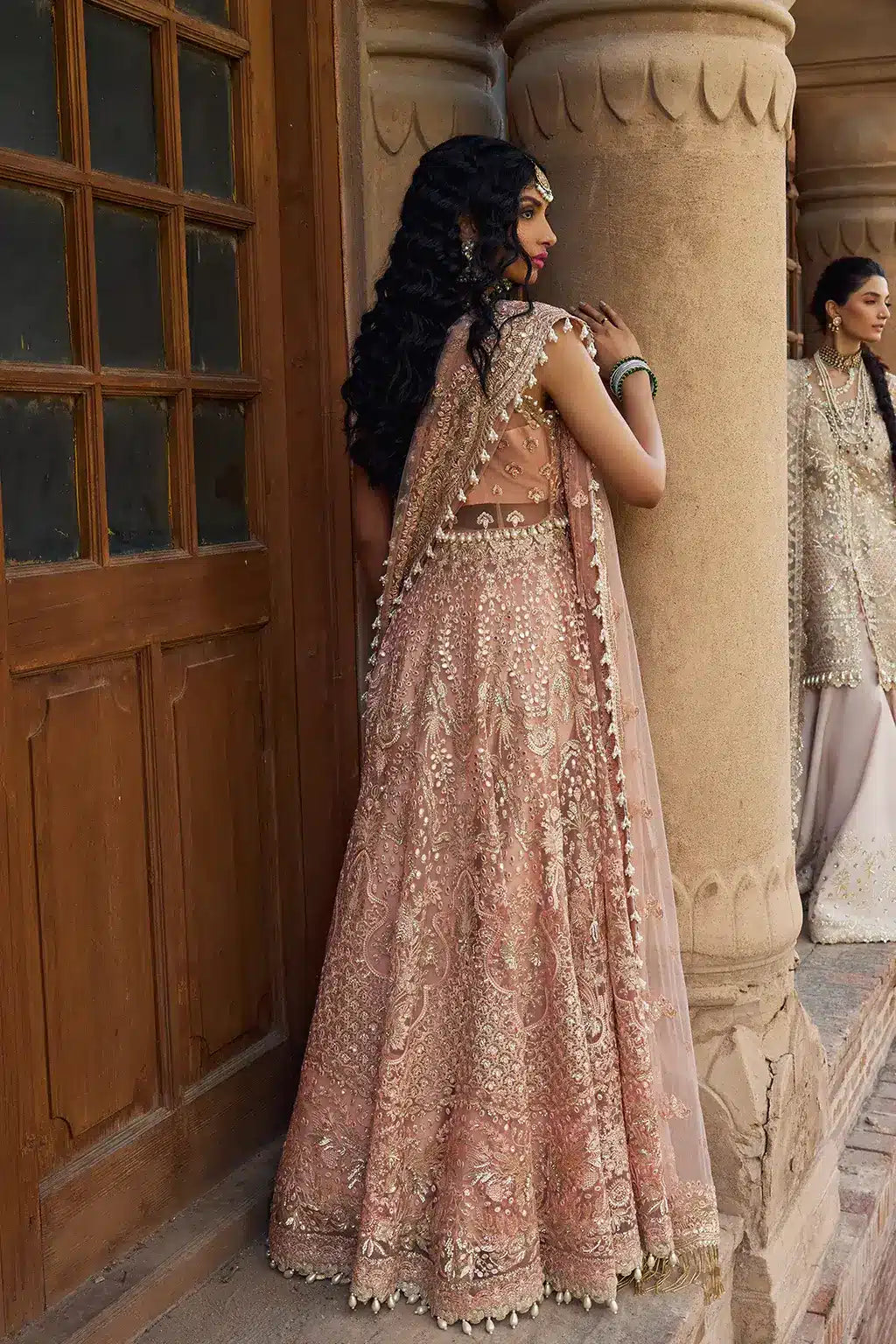 Afrozeh Dastangoi Wedding Formals Madhur – Peach Pink Pakistani Dress with intricate embroidery and embellishments. Shop elegant Asian dresses at Maria Faisal.