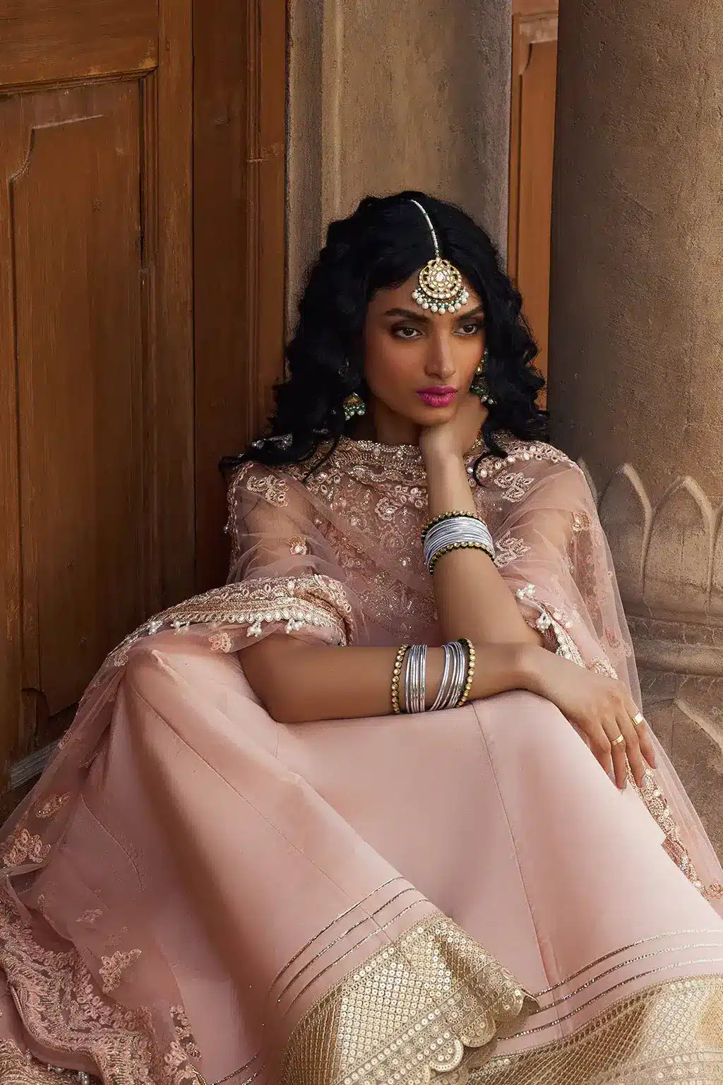 Afrozeh Dastangoi Wedding Formals Madhur – Peach Pink Pakistani Dress with intricate embroidery and embellishments. Shop elegant Asian dresses at Maria Faisal.