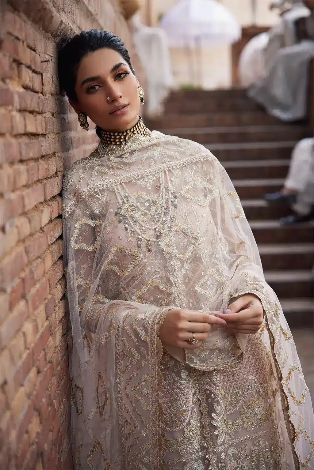 Afrozeh Dastangoi Wedding Formals Meharbano– Powder Pink Pakistani Dress with intricate embroidery and embellishments. Shop elegant Asian dresses at Maria Faisal.
