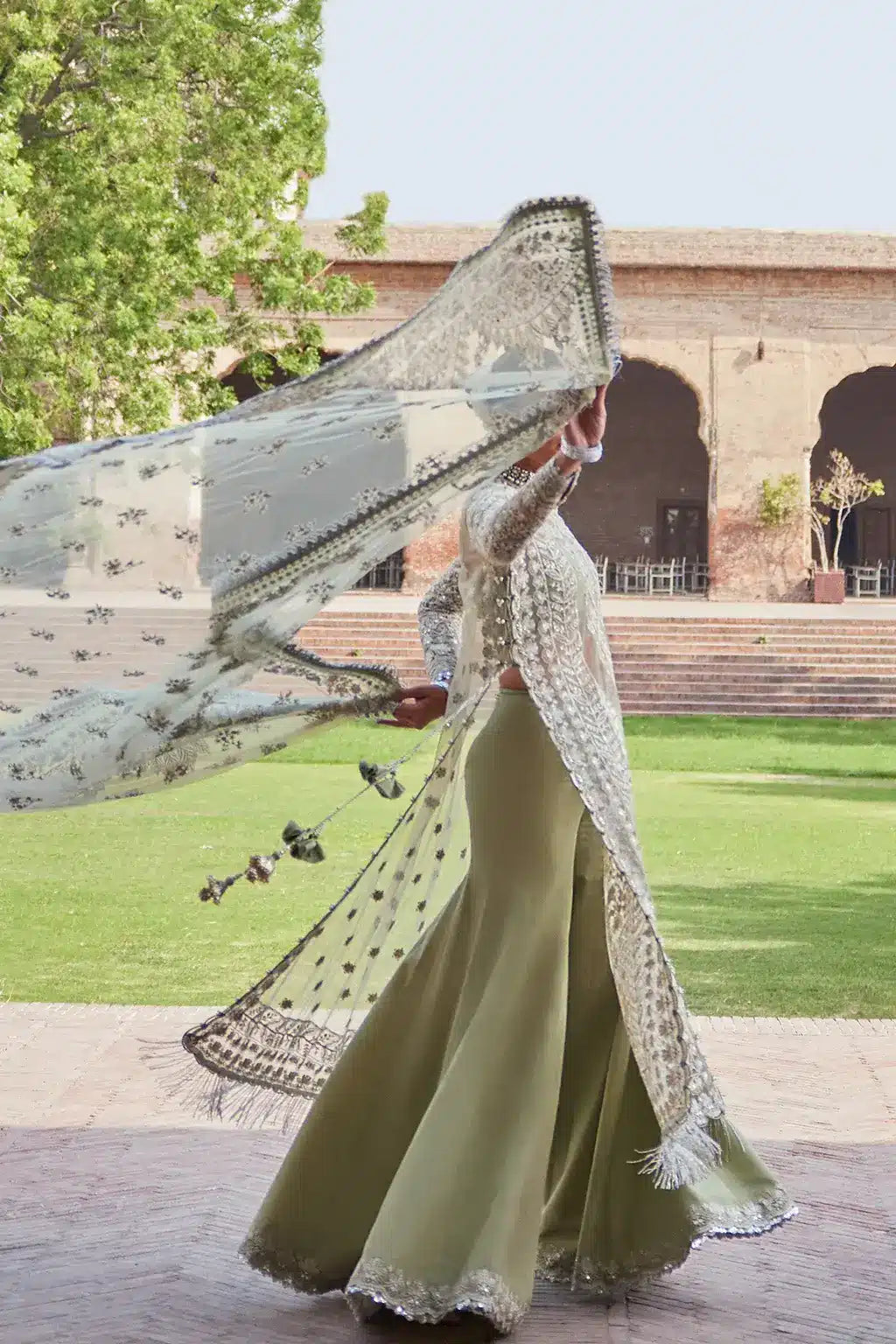 Afrozeh Dastangoi Wedding Formals Nigar– Mint Green Pakistani Dress with intricate embroidery and embellishments. Shop elegant Asian dresses at Maria Faisal.