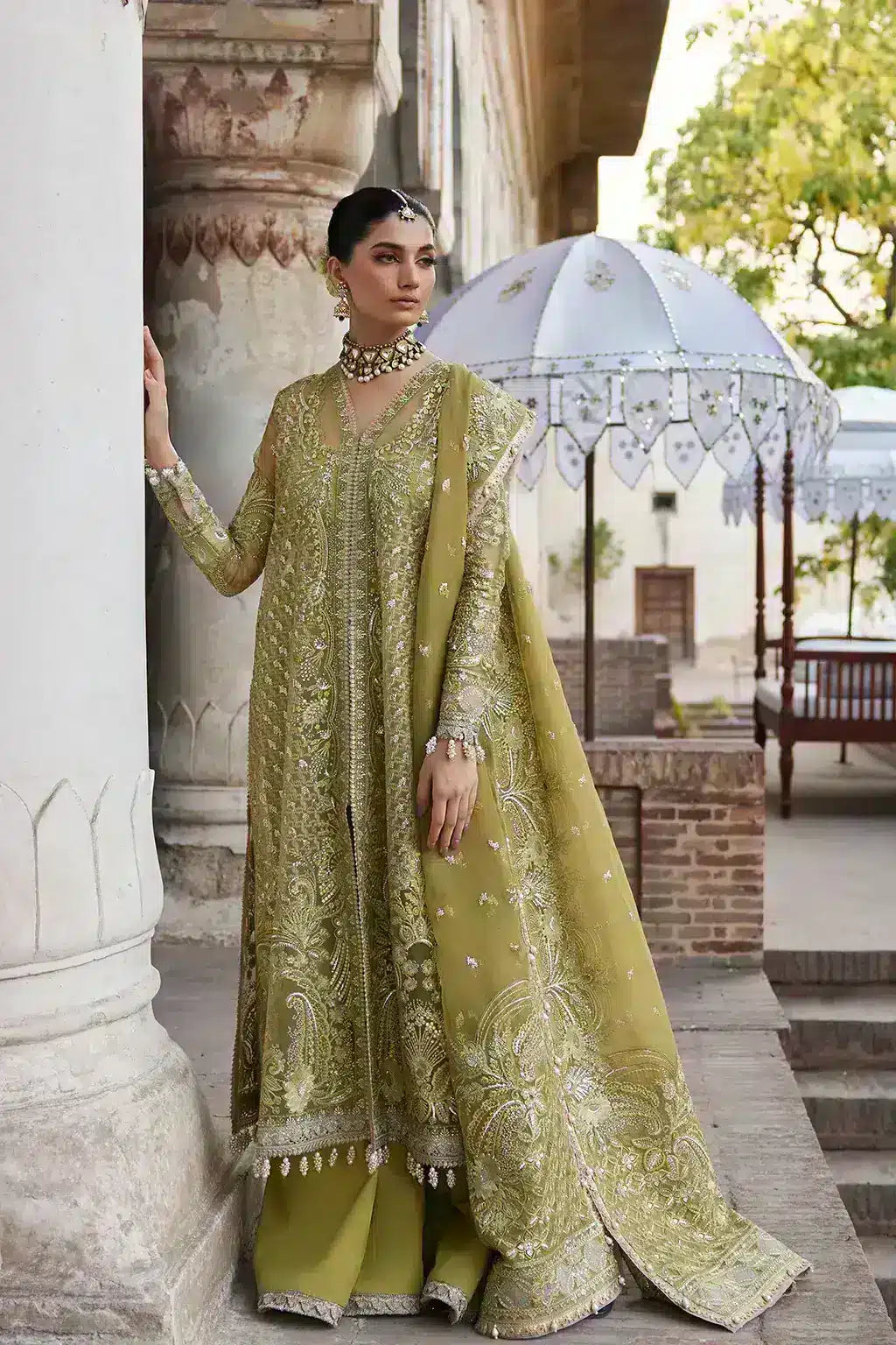 Afrozeh Dastangoi Wedding Formals Shehnaz – Green Pakistani Dress with intricate embroidery and embellishments. Shop elegant Asian dresses at Maria Faisal.