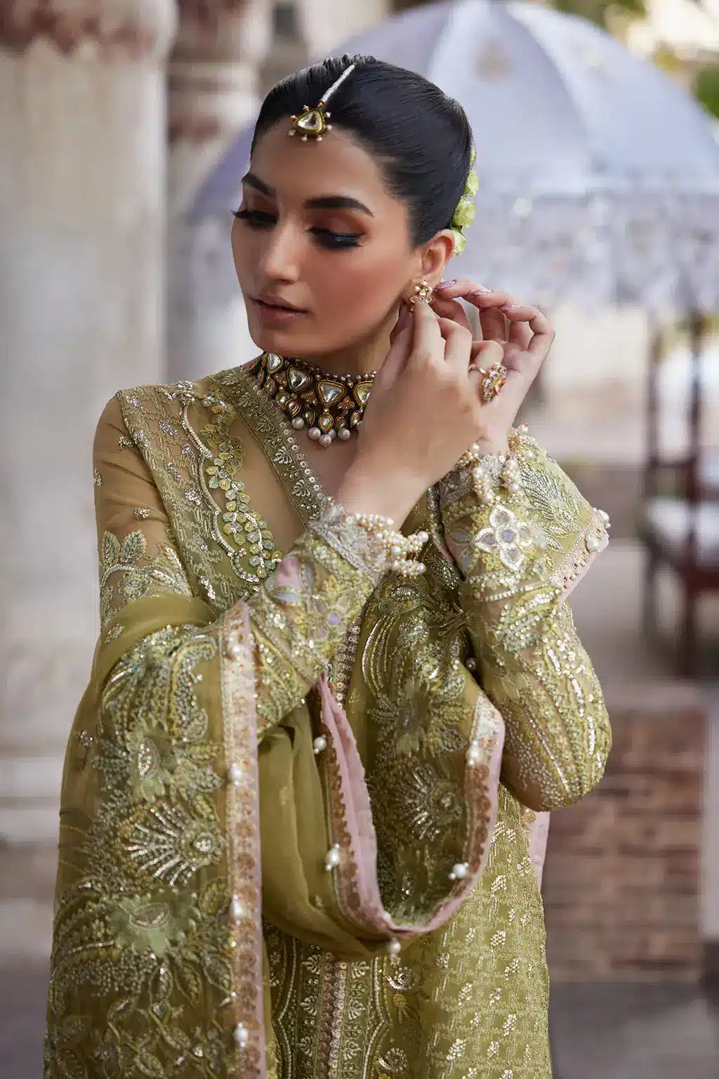 Afrozeh Dastangoi Wedding Formals Shehnaz – Green Pakistani Dress with intricate embroidery and embellishments. Shop elegant Asian dresses at Maria Faisal.