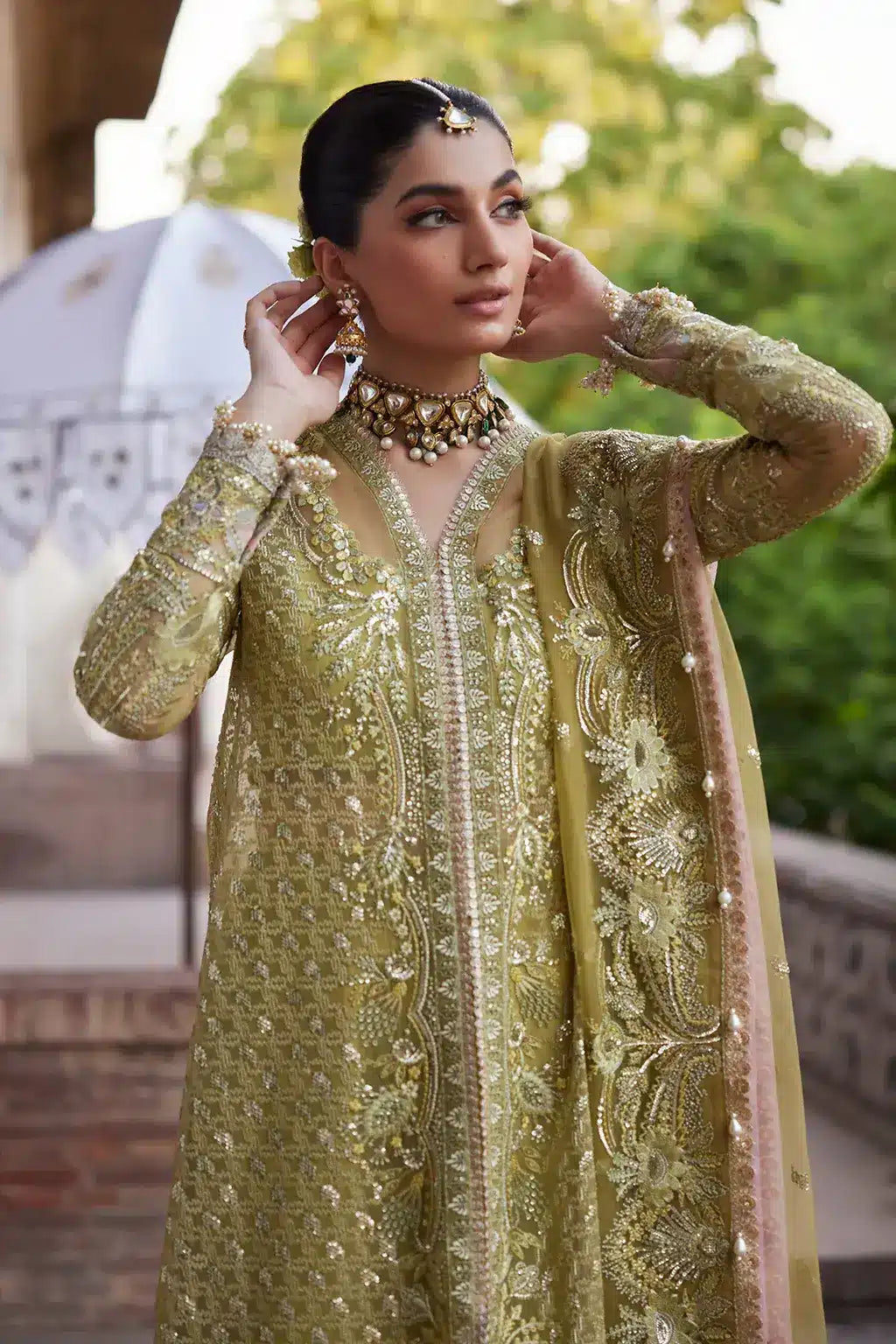 Afrozeh Dastangoi Wedding Formals Shehnaz – Green Pakistani Dress with intricate embroidery and embellishments. Shop elegant Asian dresses at Maria Faisal.