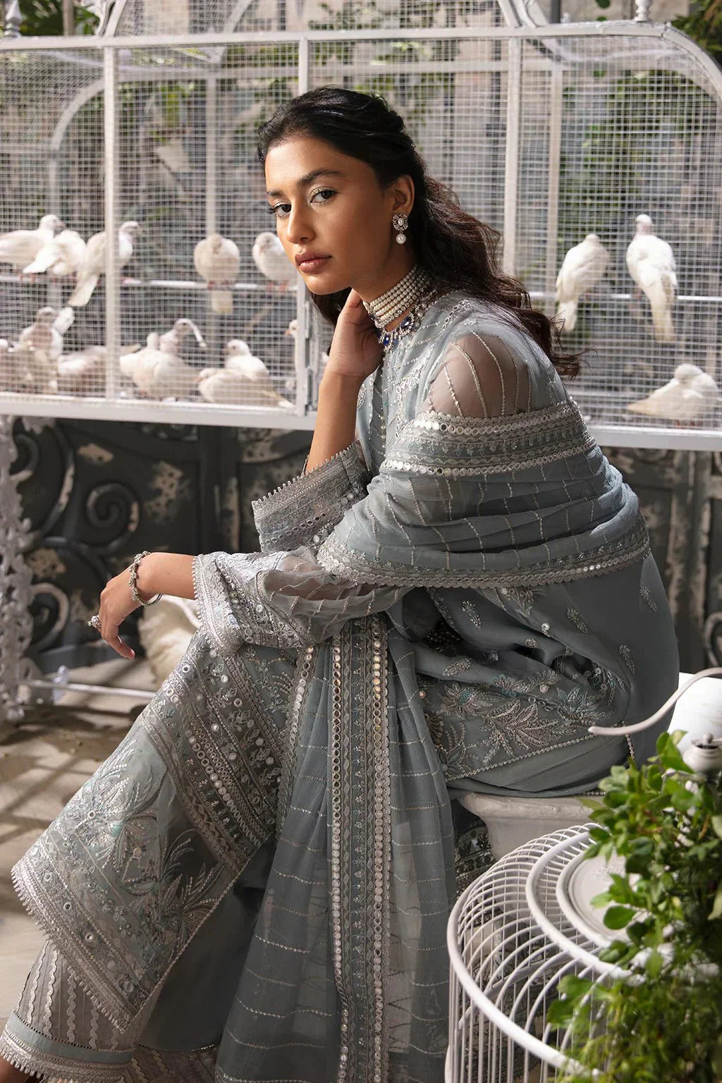 Afrozeh La Fuchsia 24 Caroline – Ice Blue Pakistani Bridal Dress with intricate embroidery and embellishments. Shop elegant Asian dresses at Maria Faisal.