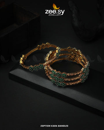 Egyptian Kara Bangles - Designer Dress with Intricate embroidery and embellishments. Shop elegent wedding dress at Maria Faisal.