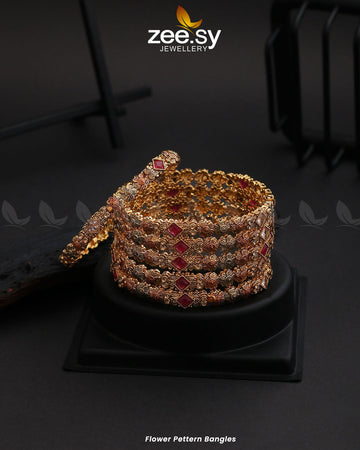 Flower Pettern Bangles - Designer Dress with Intricate embroidery and embellishments. Shop elegent wedding dress at Maria Faisal.