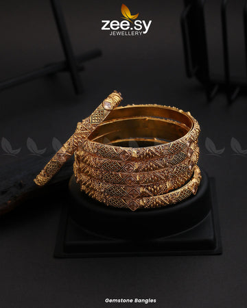 Gemstone Bangles - Designer Dress with Intricate embroidery and embellishments. Shop elegent wedding dress at Maria Faisal.