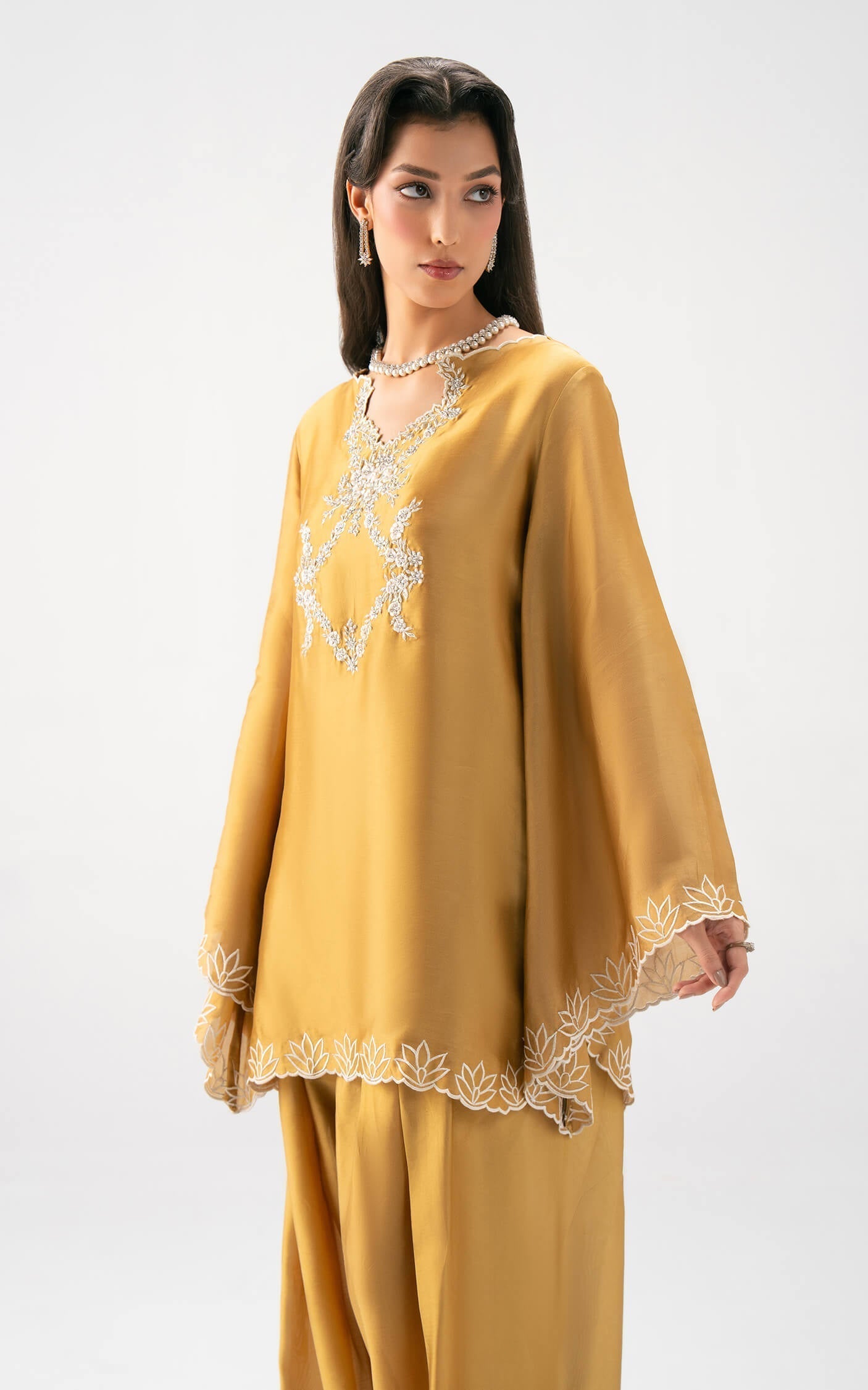 Asifa and Nabeel | Celevara Luxe | Golden Reverie - Luxury Dress - available at Maria Faisal in UK and USA.