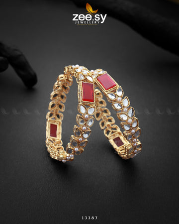 Avila Bangles - Designer Dress with Intricate embroidery and embellishments. Shop elegent wedding dress at Maria Faisal.