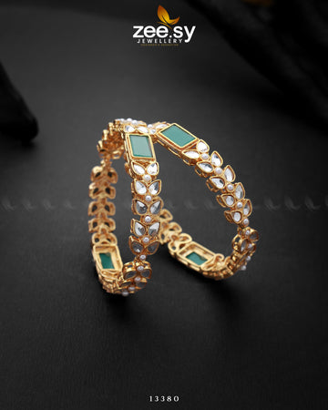 Fortune Bangles - Designer Dress with Intricate embroidery and embellishments. Shop elegent wedding dress at Maria Faisal.