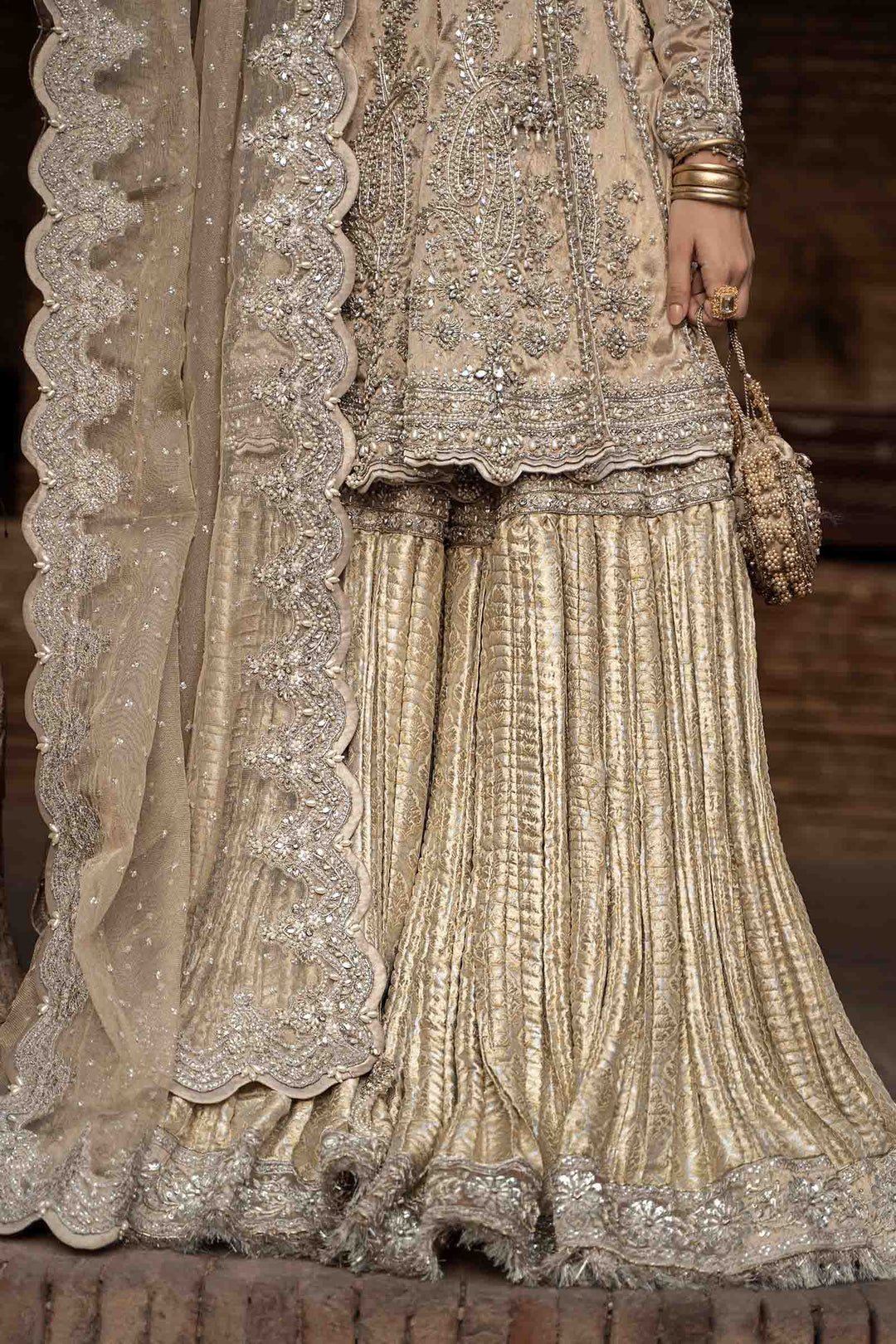 Maria B | Bridal Couture | Oriana - Designer Dress with Intricate embroidery and embellishments. Shop elegent wedding dress at Maria Faisal.