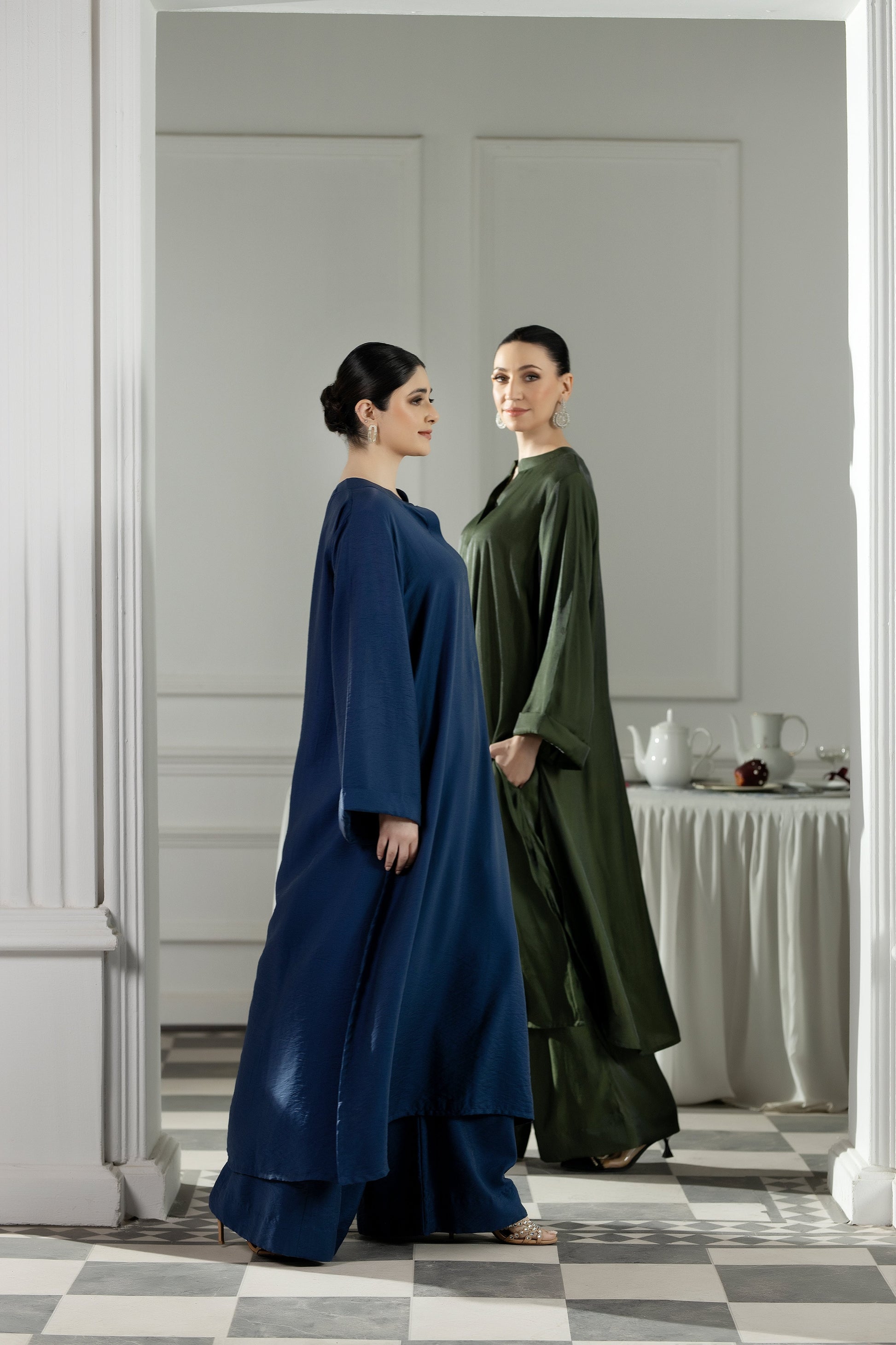 Purple Haze | Suraya Edit | Ethereal in Teal Blue - Luxury Dress - available at Maria Faisal in UK and USA.