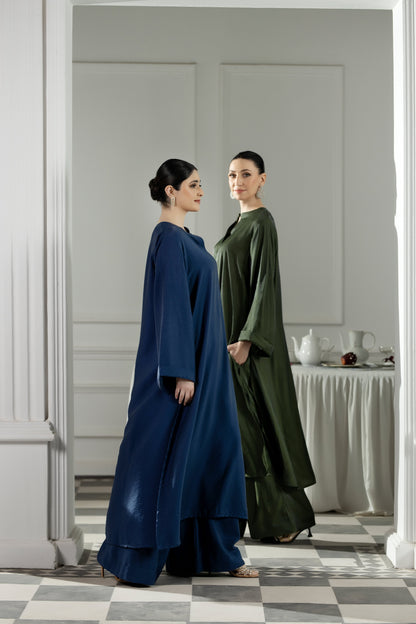 Purple Haze | Suraya Edit | Ethereal in Teal Blue - Luxury Dress - available at Maria Faisal in UK and USA.