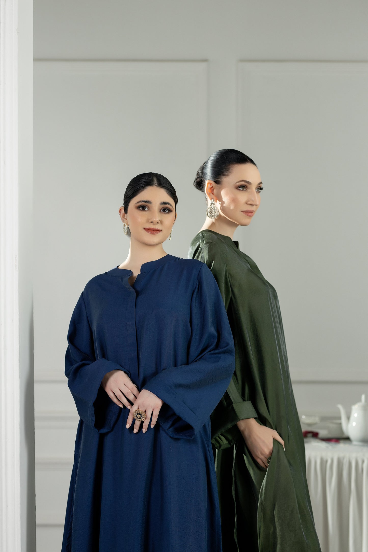 Purple Haze | Suraya Edit | Ethereal in Teal Blue - Luxury Dress - available at Maria Faisal in UK and USA.