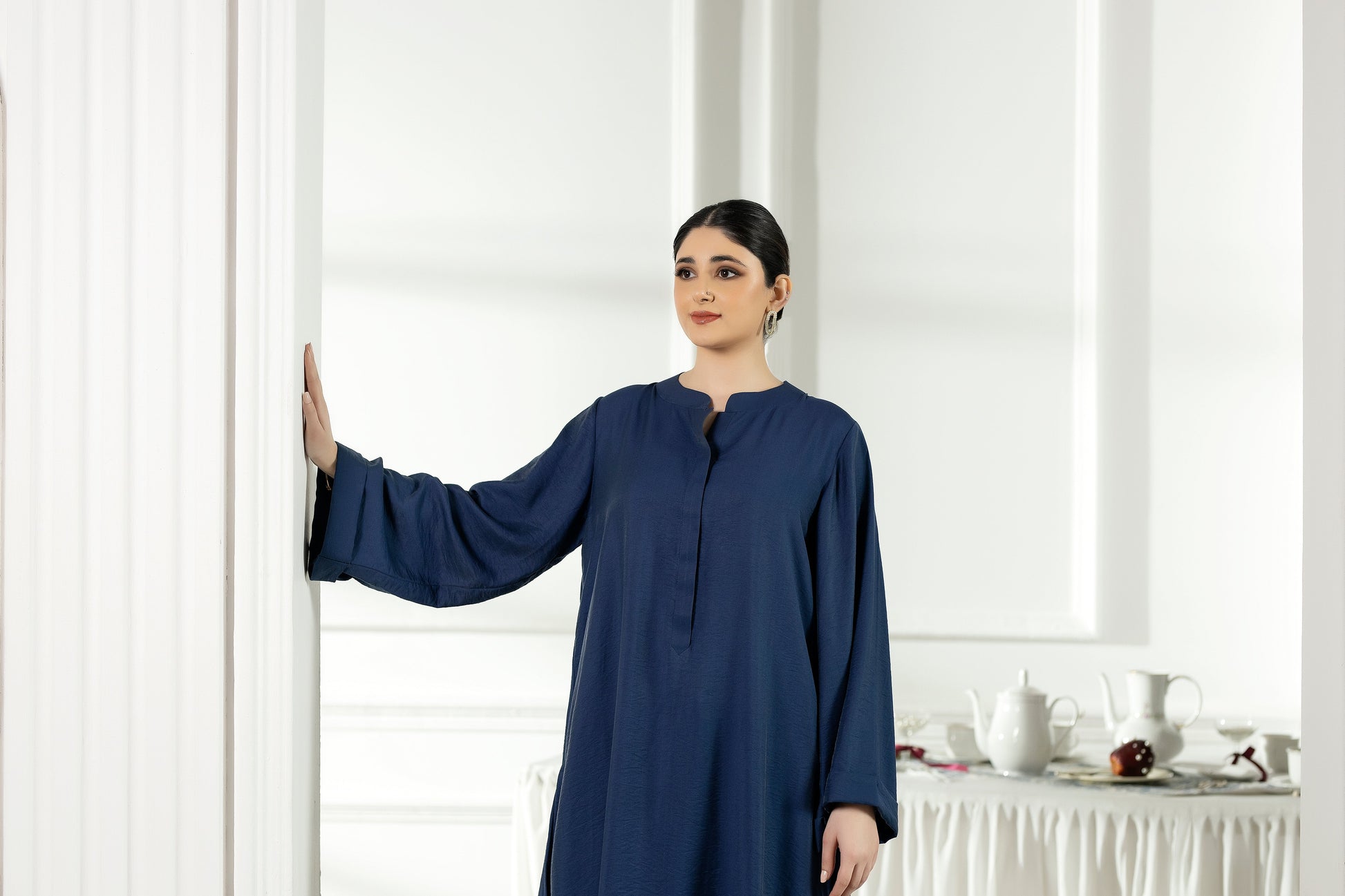 Purple Haze | Suraya Edit | Ethereal in Teal Blue - Luxury Dress - available at Maria Faisal in UK and USA.