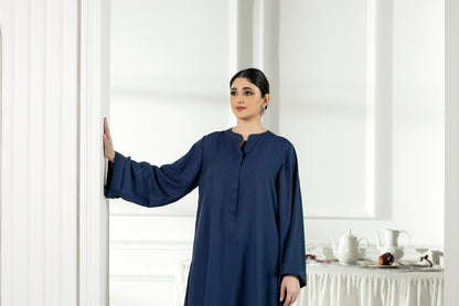 Purple Haze | Suraya Edit | Ethereal in Teal Blue - Luxury Dress - available at Maria Faisal in UK and USA.