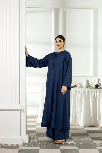Purple Haze | Suraya Edit | Ethereal in Teal Blue - Luxury Dress - available at Maria Faisal in UK and USA.