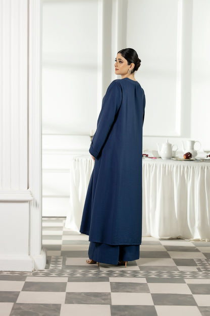 Purple Haze | Suraya Edit | Ethereal in Teal Blue - Luxury Dress - available at Maria Faisal in UK and USA.
