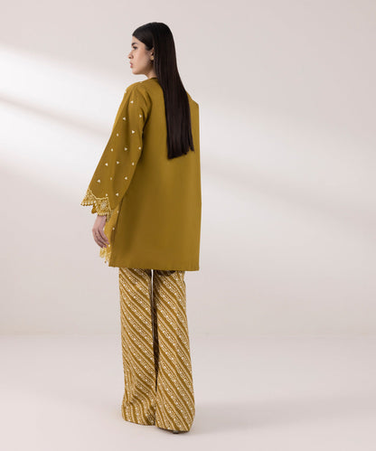 Sapphire | Intermix 2024 | Cambric Suit S-33 - Designer Dress with Intricate embroidery and embellishments. Shop elegent wedding dress at Maria Faisal.