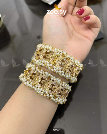 Gajra Kangan Bangles - Designer Dress with Intricate embroidery and embellishments. Shop elegent wedding dress at Maria Faisal.