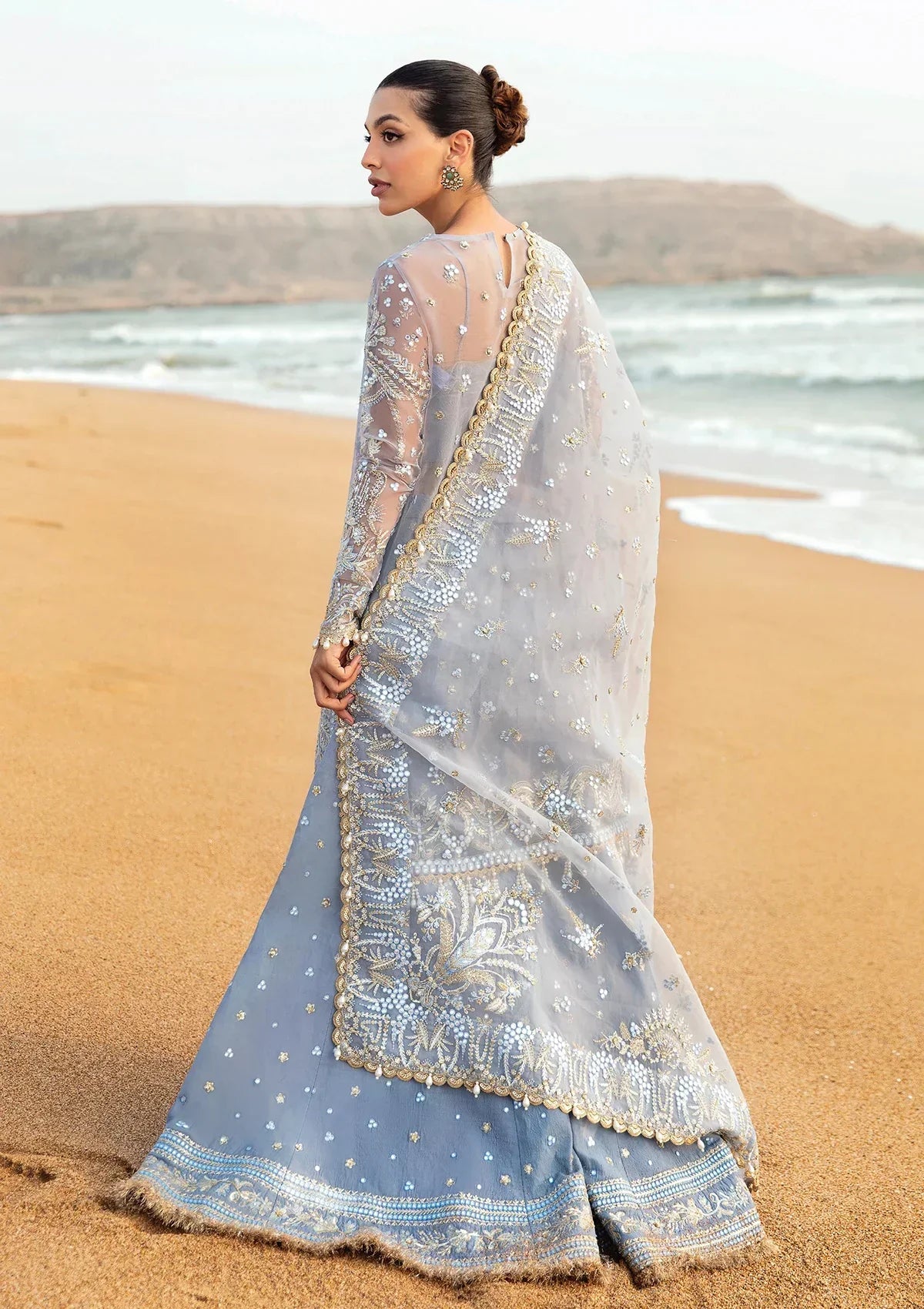 Afrozeh Dastangoi Wedding Formal'24 AWE-01 NASHMIA - Ice Blue Pakistani Dress with intricate embroidery and embellishments. Shop elegant Asian dresses at Maria Faisal.