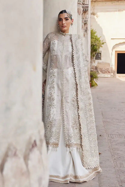 Afrozeh Dastangoi Wedding Formals Noori– Off White Pakistani Dress with intricate embroidery and embellishments. Shop elegant Asian dresses at Maria Faisal.