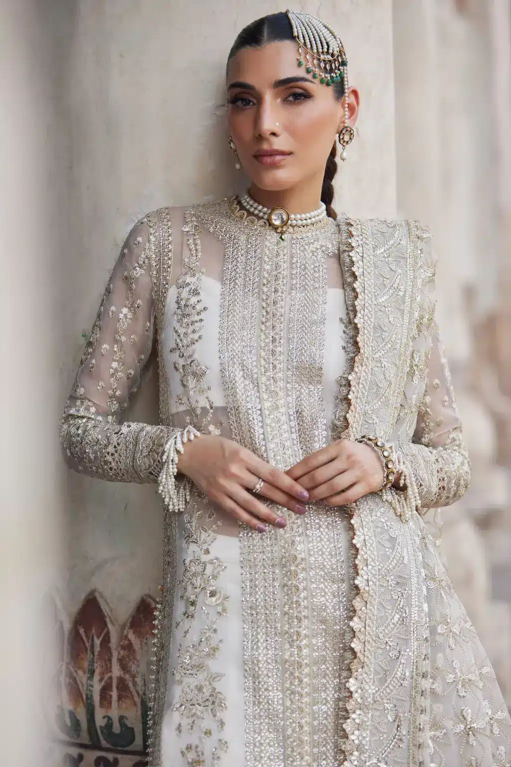 Afrozeh Dastangoi Wedding Formals Noori– Off White Pakistani Dress with intricate embroidery and embellishments. Shop elegant Asian dresses at Maria Faisal.