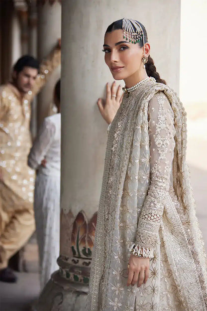 Afrozeh Dastangoi Wedding Formals Noori– Off White Pakistani Dress with intricate embroidery and embellishments. Shop elegant Asian dresses at Maria Faisal.