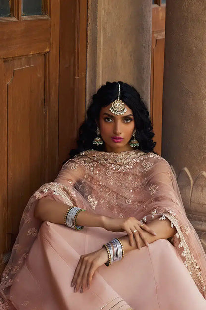 Afrozeh Dastangoi Wedding Formals Madhur – Peach Pink Pakistani Dress with intricate embroidery and embellishments. Shop elegant Asian dresses at Maria Faisal.