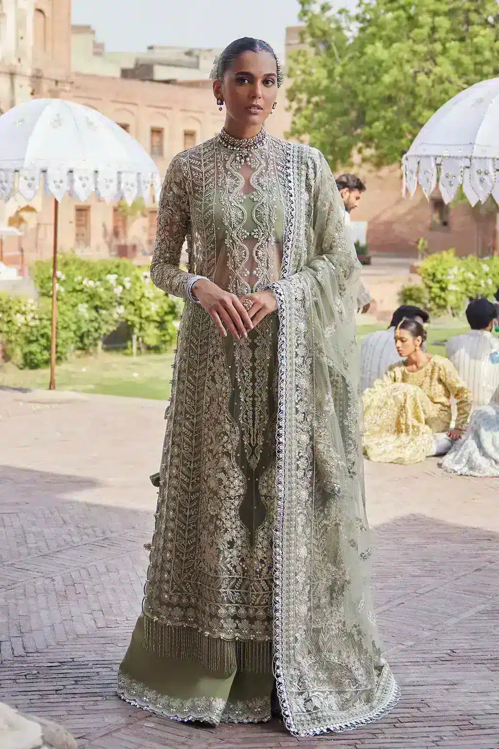 Afrozeh Dastangoi Wedding Formals Nigar– Mint Green Pakistani Dress with intricate embroidery and embellishments. Shop elegant Asian dresses at Maria Faisal.