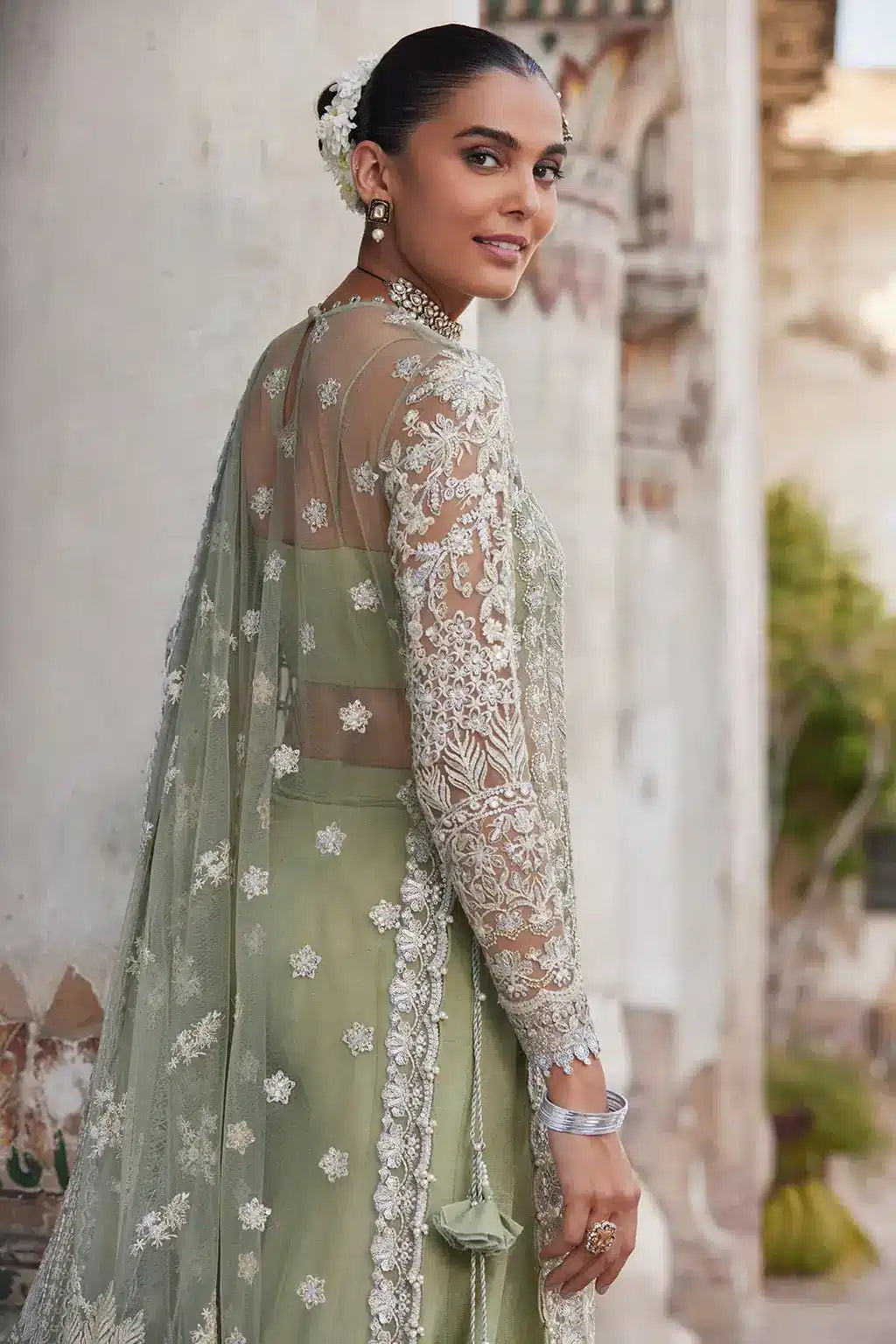 Afrozeh Dastangoi Wedding Formals Nigar– Mint Green Pakistani Dress with intricate embroidery and embellishments. Shop elegant Asian dresses at Maria Faisal.