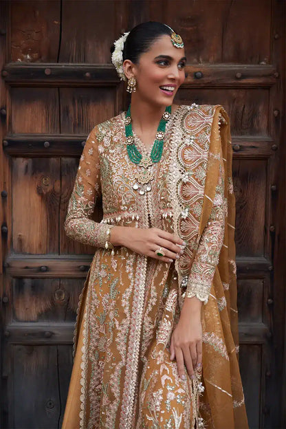 Afrozeh Dastangoi Wedding Formals Shafaq – Mustard Orange Pakistani Dress with intricate embroidery and embellishments. Shop elegant Asian dresses at Maria Faisal.