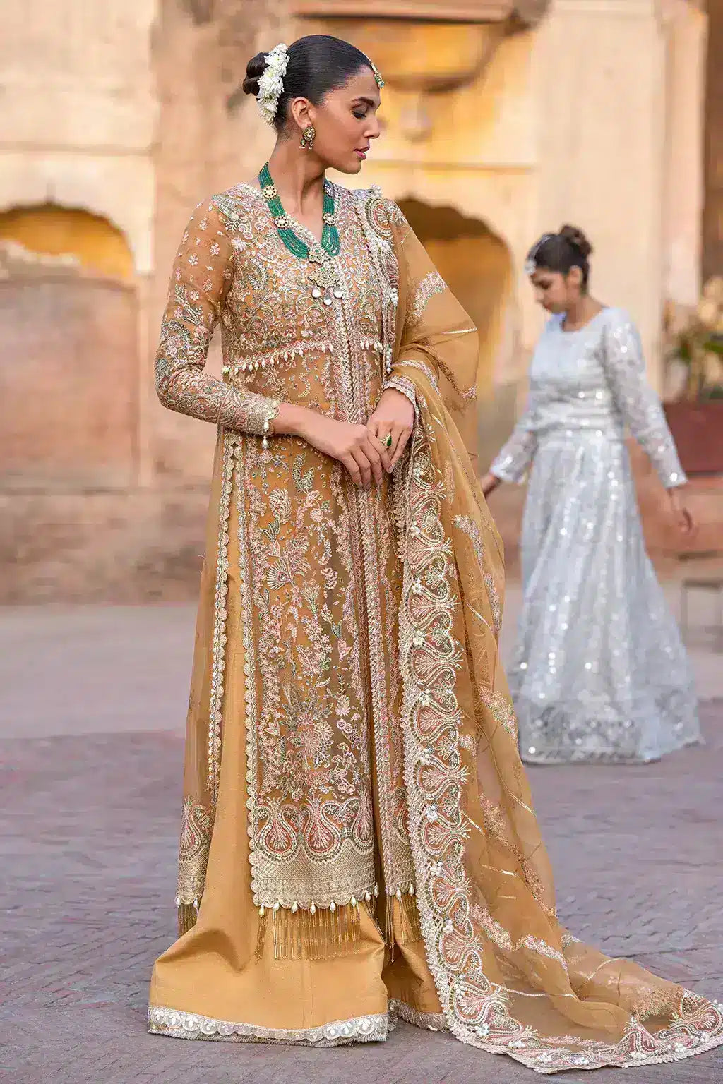 Afrozeh Dastangoi Wedding Formals Shafaq – Mustard Orange Pakistani Dress with intricate embroidery and embellishments. Shop elegant Asian dresses at Maria Faisal.