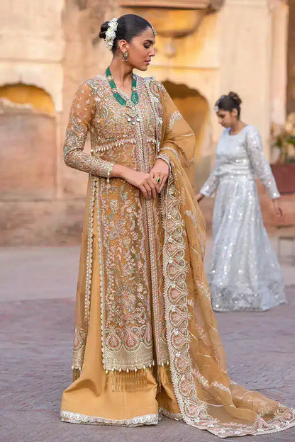 Afrozeh Dastangoi Wedding Formals Shafaq – Mustard Orange Pakistani Dress with intricate embroidery and embellishments. Shop elegant Asian dresses at Maria Faisal.
