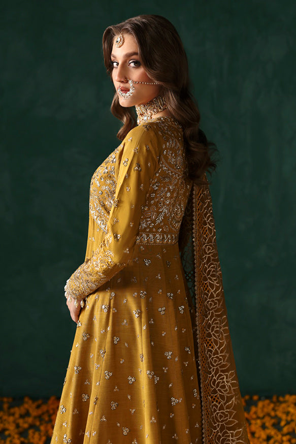 Afrozeh Divani Silk Edit 24 Jahanbano – Mustard/Gold Pakistani Dress with intricate embroidery and embellishments. Shop elegant Asian dresses at Maria Faisal.