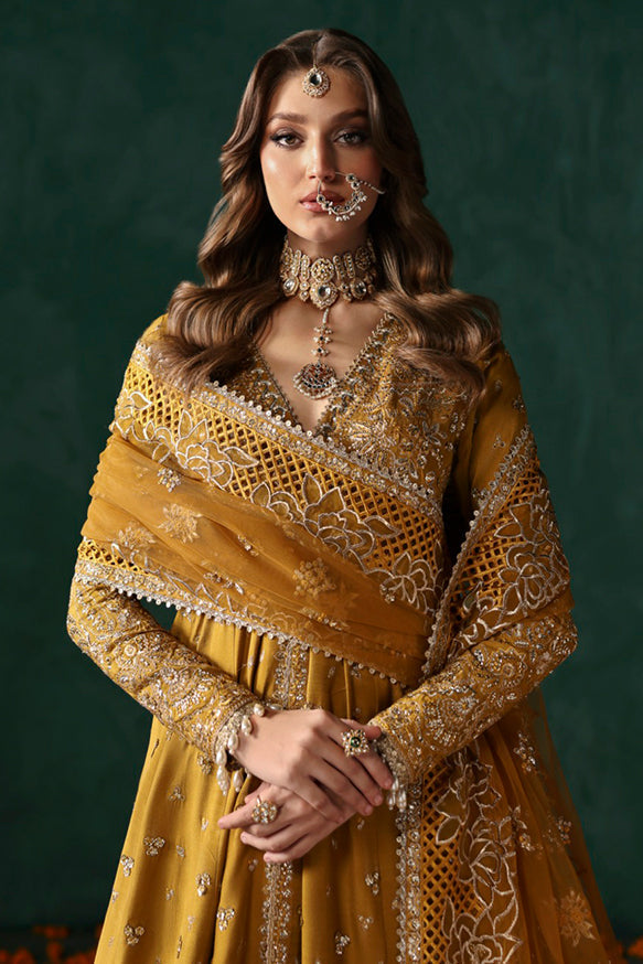 Afrozeh Divani Silk Edit 24 Jahanbano – Mustard/Gold Pakistani Dress with intricate embroidery and embellishments. Shop elegant Asian dresses at Maria Faisal.