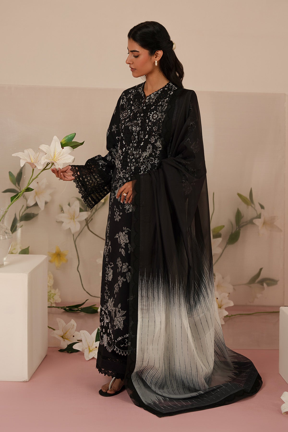 Afrozeh Floral Charm 25 Lupine – Black Pakistani Dress with intricate embroidery and embellishments. Shop elegant Asian dresses at Maria Faisal.